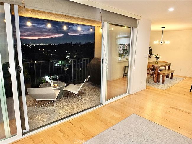 Sunset and balcony view from living room | Image 9