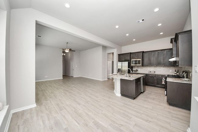 Seamless flow into the kitchen and dining areas – perfect for entertaining | Image 14