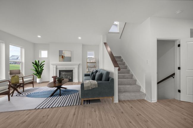 A furnished concept of the family room. | Image 7
