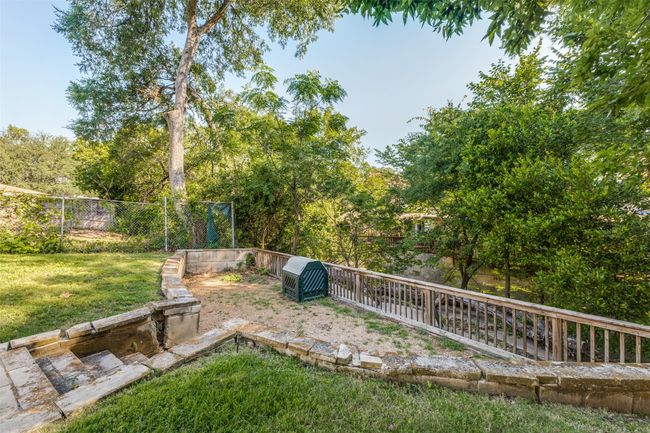 View of yard and overlook of creek | Image 25