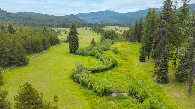 year round creek runs through the property | Image 11