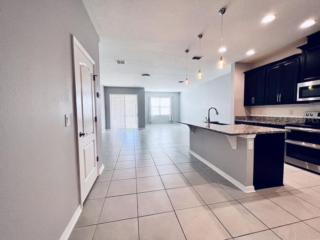 2917 Econ Landing Blvd, Townhouse with 3 bedrooms, 3 bathrooms and null parking in Orlando FL | Image 4