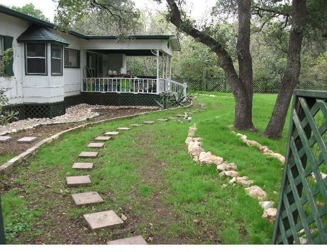 View of yard with fence | Image 14