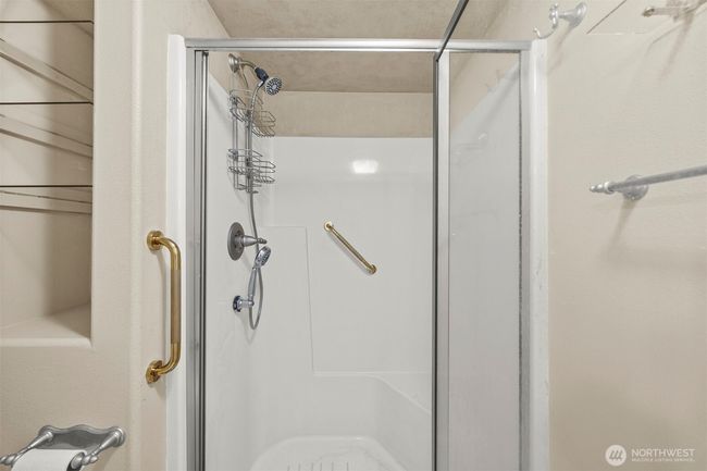 Shower area in secondary bath. | Image 21