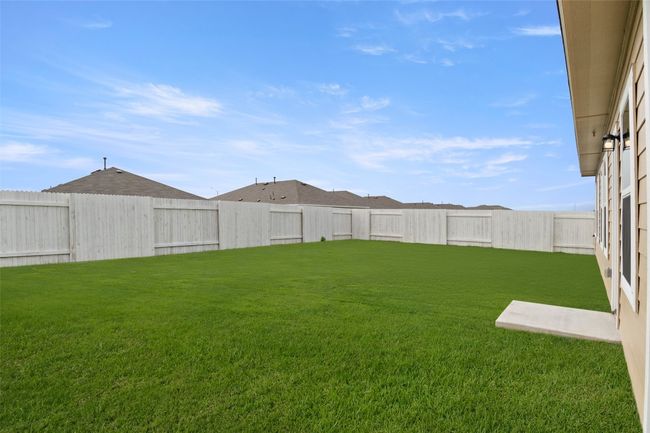 View of yard featuring a fenced backyard | Image 27