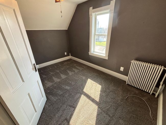 Upstairs bedroom 2 with closet | Image 18