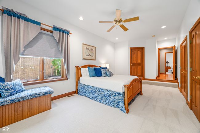 bedroom with recessed lighting, visible vents, light carpet, and baseboards | Image 84