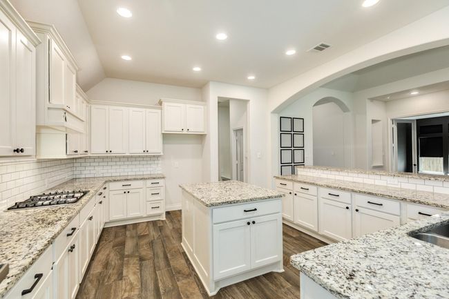 stainless steel appliances and lots of cabinet space. | Image 19