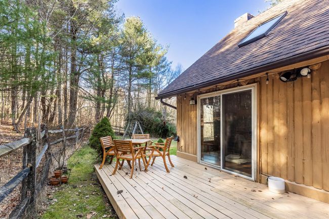 Back of property featuring a lawn and a chimney | Image 6
