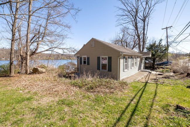 View of side of home featuring a yard | Image 5