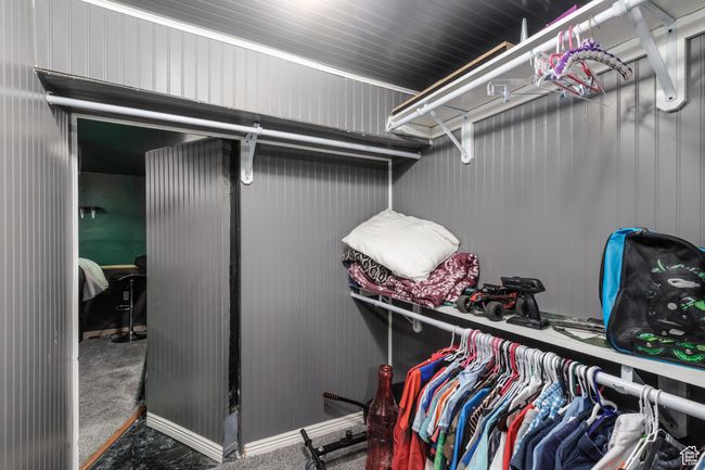 Walk in closet with carpet flooring | Image 21