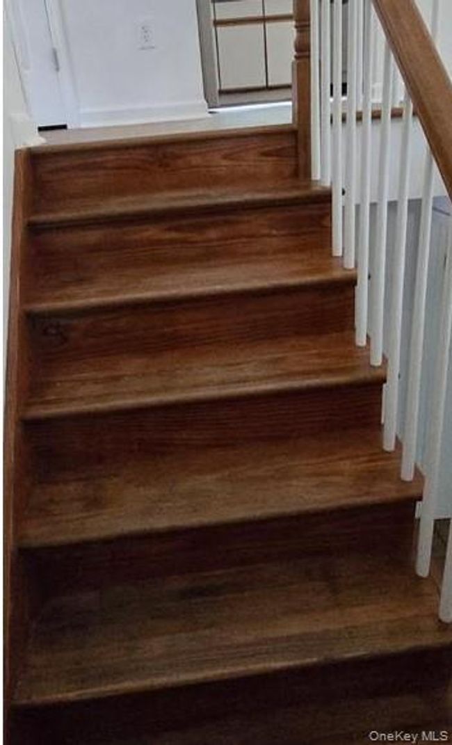 Staircase with wood finished floors | Image 11