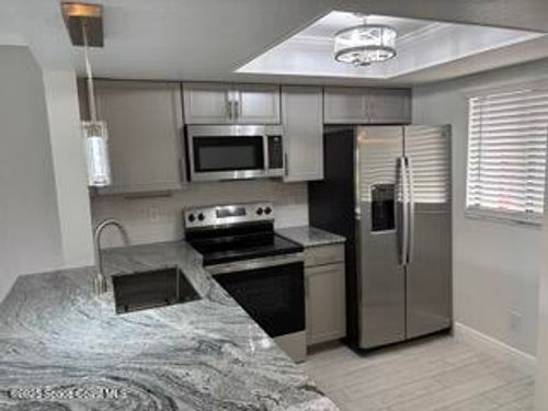 703-1704 University Ln, COCOA, FL, 32922-5633 | Card Image