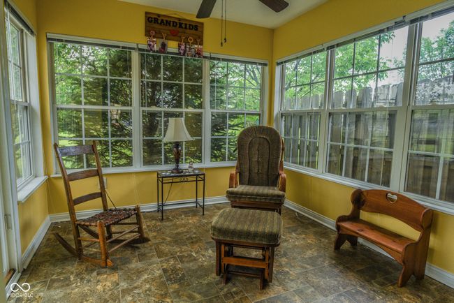 sunroom / solarium with baseboards | Image 8