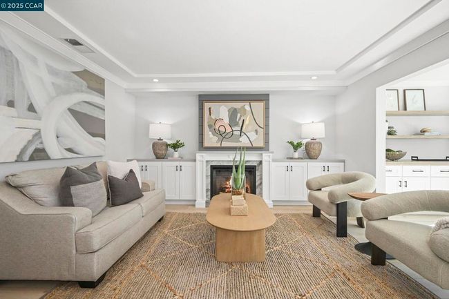 Living room with electric fireplace | Image 8