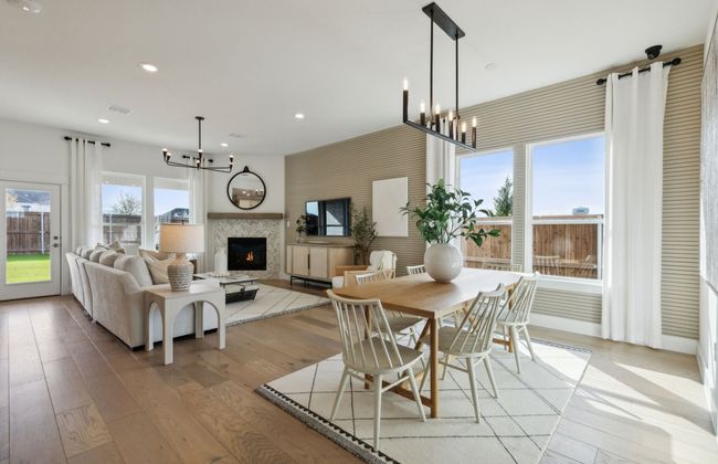 Airy dining room *Photos of furnished model. Not actual home. Representative of floor plan. Some options and features may vary | Image 6
