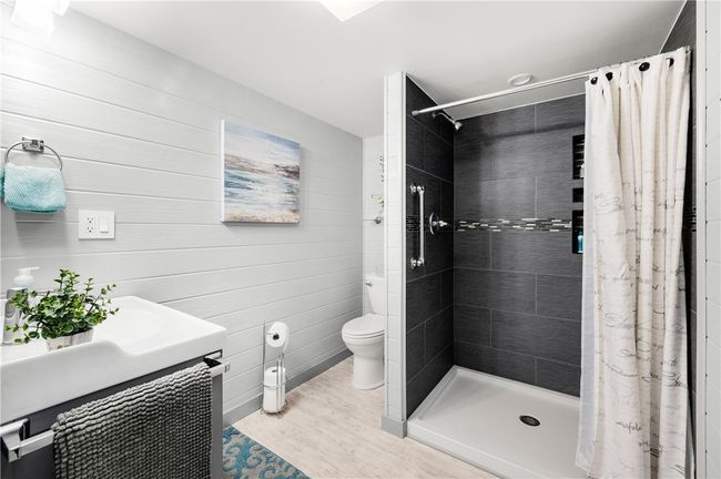 VERY STYLISH LOWER LEVEL FULL BATH. | Image 24