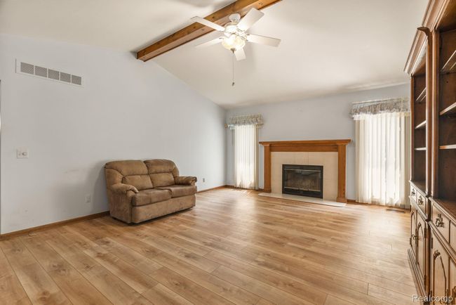 Volumnizing living room w/luxury vinyl flooring throughout | Image 5