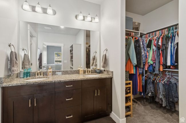 Full bathroom with double vanity and a walk in closet | Image 26