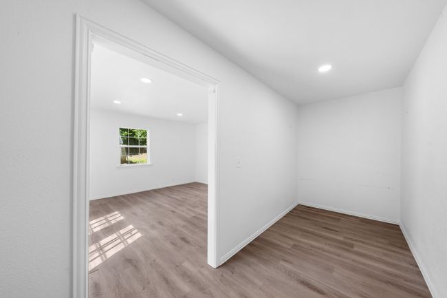 Spare room / Workshop featuring wood finished floors, recessed lighting, and electricity, A/C and baseboards | Image 26