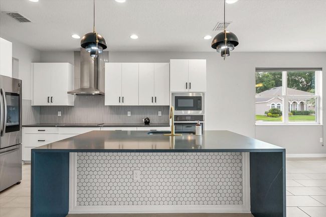 2541 Leyland Cypress Ln, House other with 5 bedrooms, 3 bathrooms and null parking in SANFORD FL | Image 6