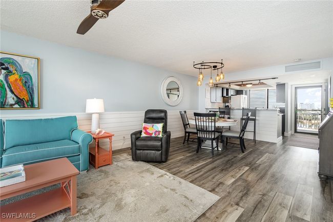 VIEW FROM LIVING AREA TOWARDS DINING, KITCHEN AND UNIT ENTRANCE | Image 5