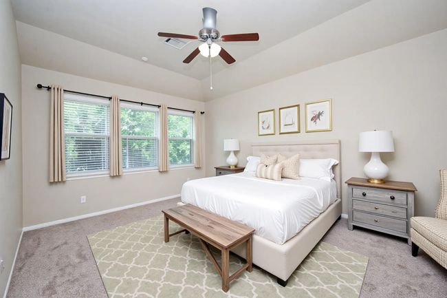 Virtual staging. Experience the potential of this inviting primary bedroom. Imagine relaxing in this bright, airy space with modern touches and plenty of natural light. | Image 23
