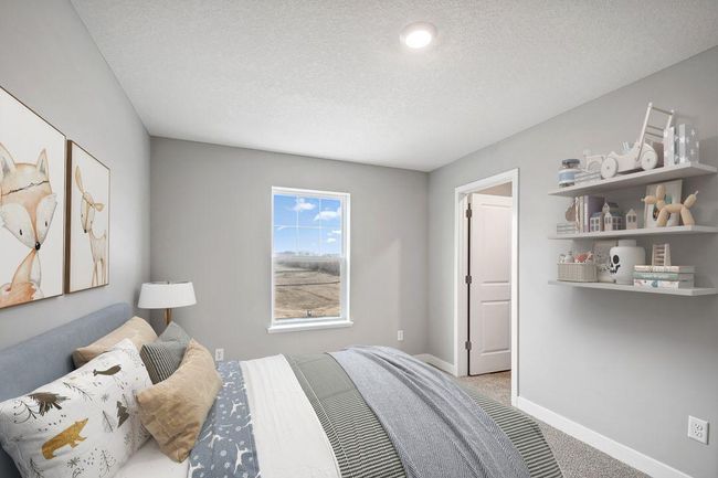 Spacious secondary bedroom with natural light. Model photos. Options and colors will vary. | Image 29