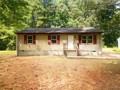 View of front of home featuring covered porch | Image 1