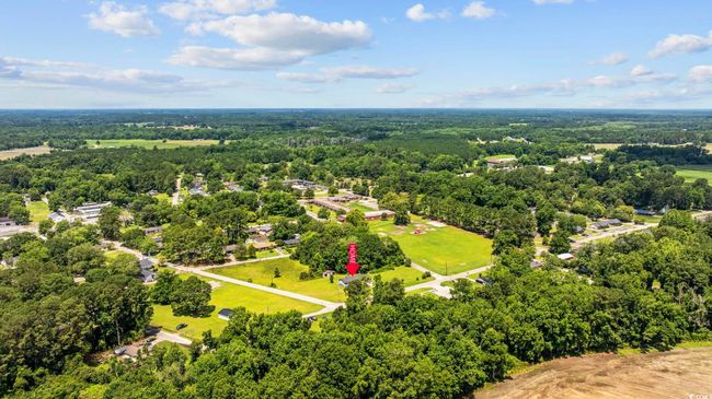 Bird's eye view of a heavily wooded area | Image 26