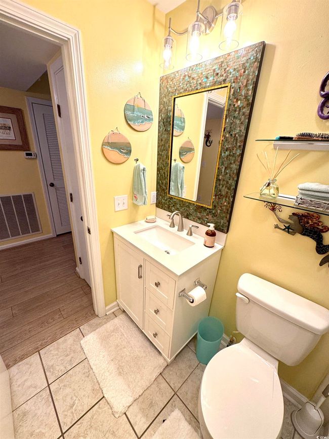 Bathroom featuring vanity and tile patterned floors | Image 25