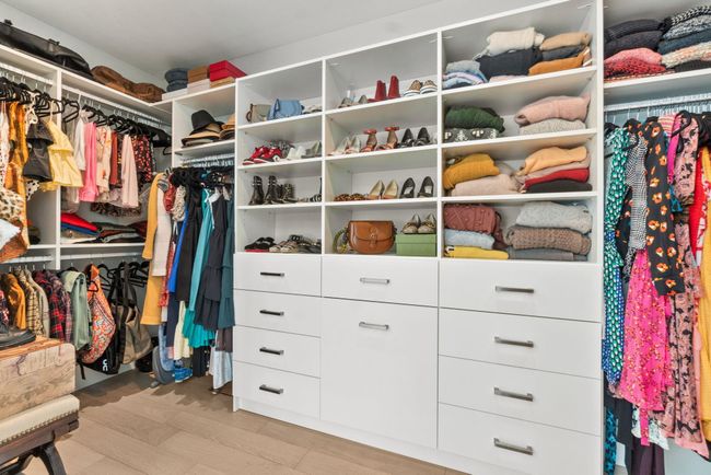 View of spacious closet | Image 17