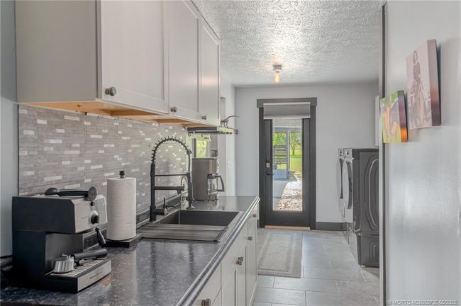 2196 Sw Ranch Trl, House other with 2 bedrooms, 2 bathrooms and 2 parking in Stuart FL | Image 25