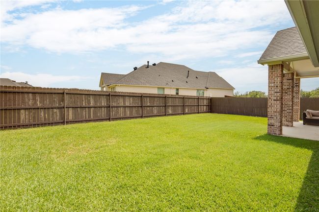 View of yard featuring a patio area | Image 23