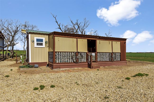 Back of house with a porch | Image 16