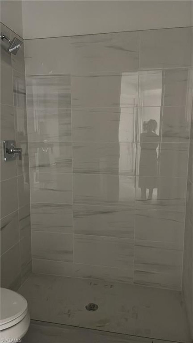 Guest bathroom with frameless walk-in shower | Image 10