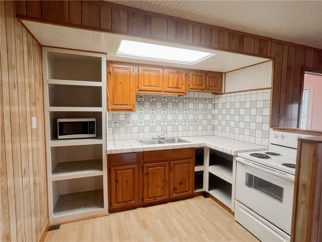 156 Naylor Rd, House attached with 4 bedrooms, 3 bathrooms and null parking in Calliham TX | Image 13