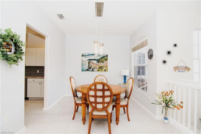 Large dining room adjacent to the kitchen. for enjoyable family dinners. | Image 10