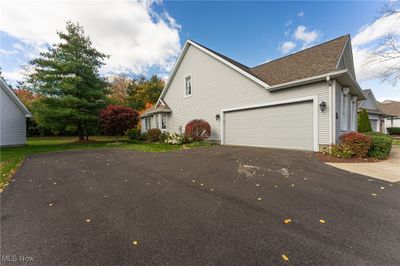 Side entry garage with long driveway | Image 2