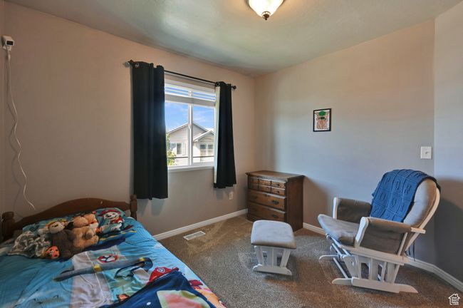 View of carpeted bedroom | Image 21