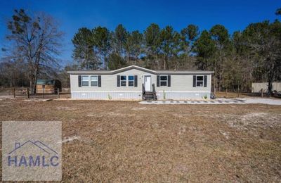 45 Logan Ct Se, House other with 4 bedrooms, 2 bathrooms and null parking in Ludowici GA | Image 1