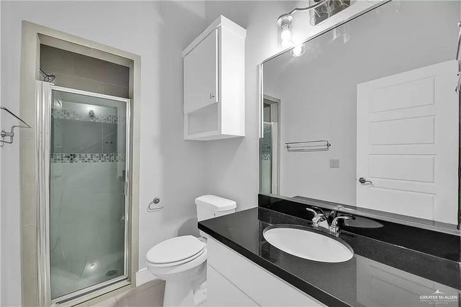 Full bath with vanity and a shower stall | Image 6