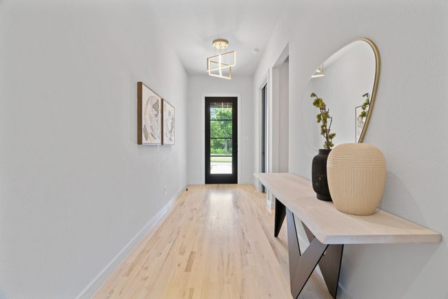 Entryway featuring light wood-type flooring and baseboards | Image 8
