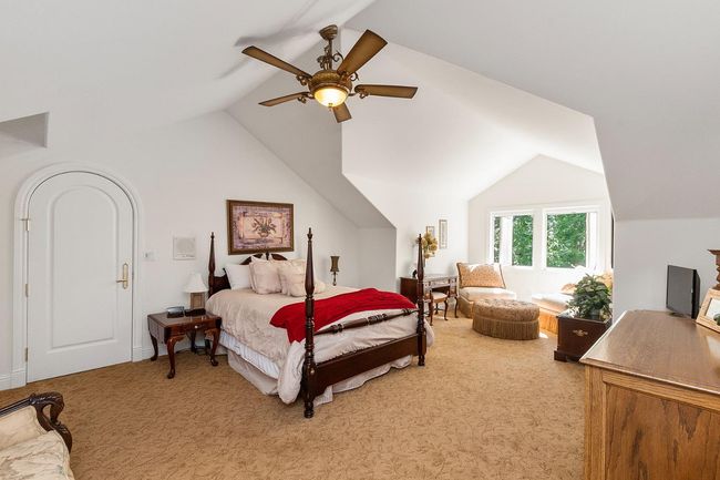 Upstairs master suite. Notice the custom door and ceiling at sitting area. | Image 33