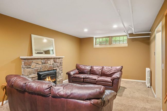 Cozy gas fireplace in lower level | Image 24