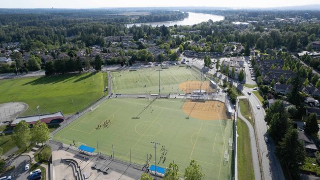 Aerial view of property and surrounding area with a nearby body of water and a forest | Image 35