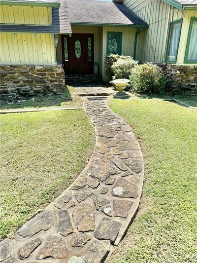 View of exterior entry featuring a yard | Image 3