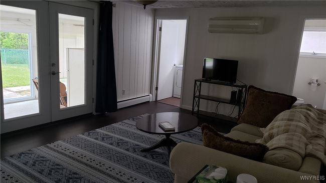 Family room with access to the 1st flr laundry & 1/2 bath | Image 8