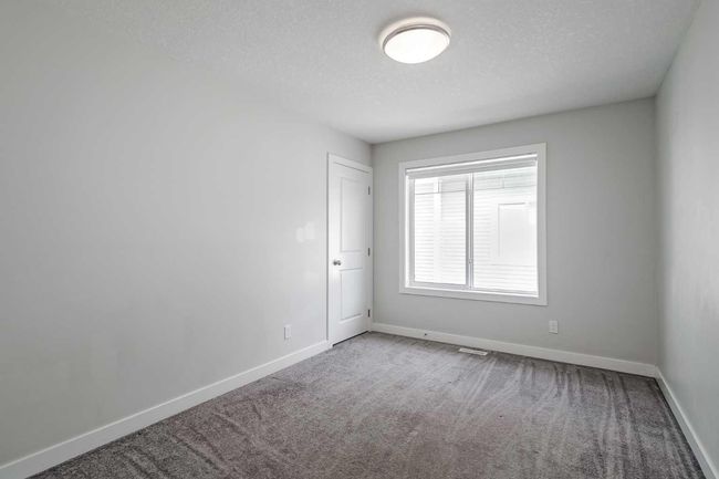 282 Canals Cross Sw, Townhouse with 3 bedrooms, 3 bathrooms and 2 parking in Airdrie AB | Image 23