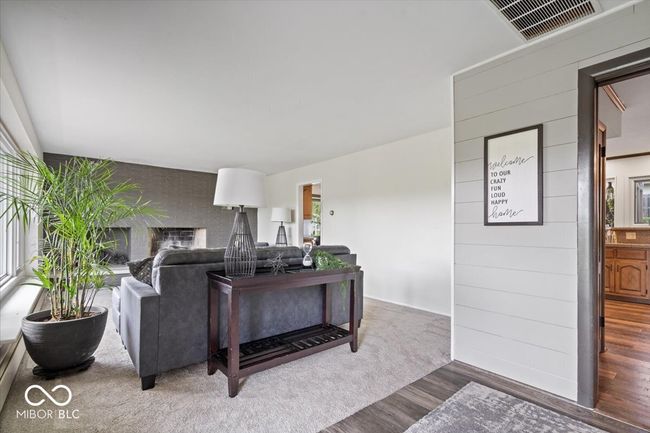 living area with wood finished floors | Image 6